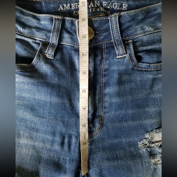 American Eagle Mid Wash Blue Distressed Ripped Mid Rise Skinny Jeans Size 00 - Picture 2 of 8